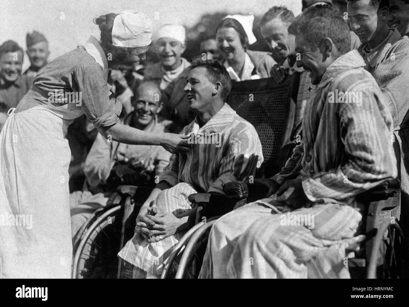 WWI, Red Cross Nurse with Wounded Soldiers Stock Photo