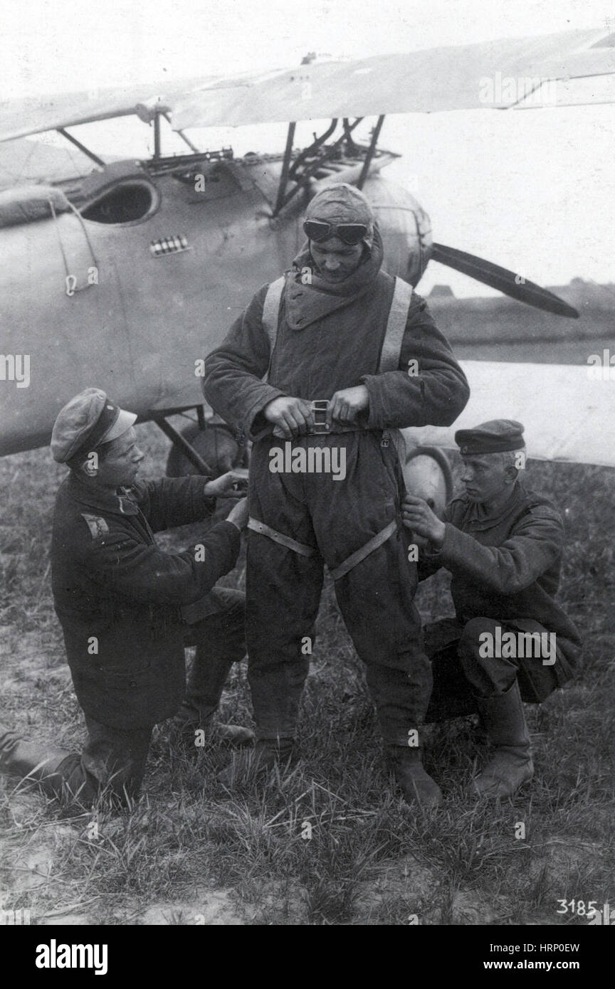 WWI, German Pilot Being Fitted with Parachute Stock Photo