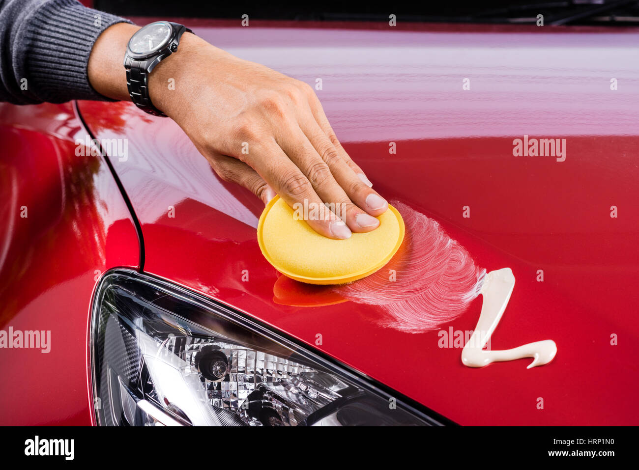 car care concept, polishing the red car Stock Photo Alamy