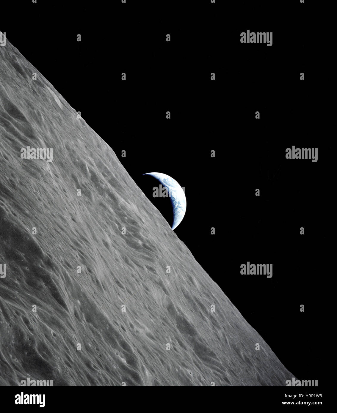 Crescent Earth Rising Behind Moon, Apollo 17 Stock Photo