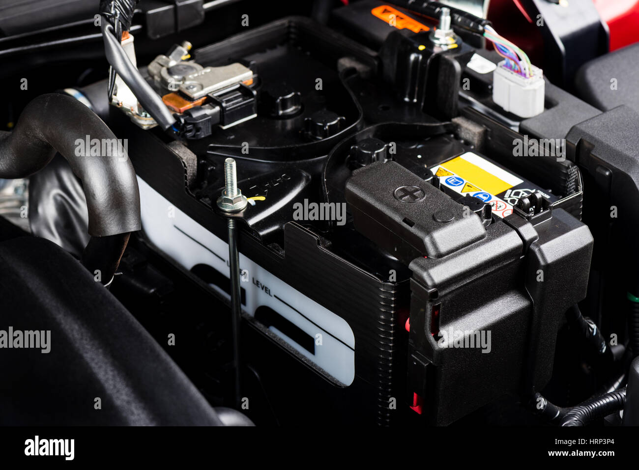 closeup new battery car in engine room, car maintenance concept Stock ...