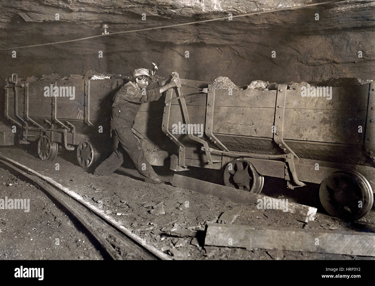 WV Coal Mining, Boy Braking Coal Train, 1908 Stock Photo