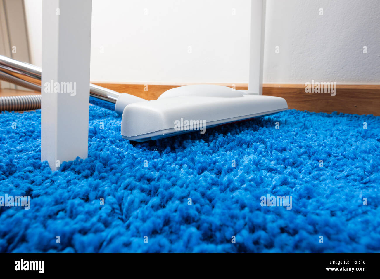 cleaning home with vacuum cleaner, housework concept Stock Photo