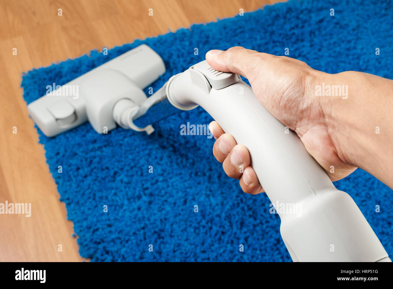 cleaning home with vacuum cleaner, housework concept Stock Photo