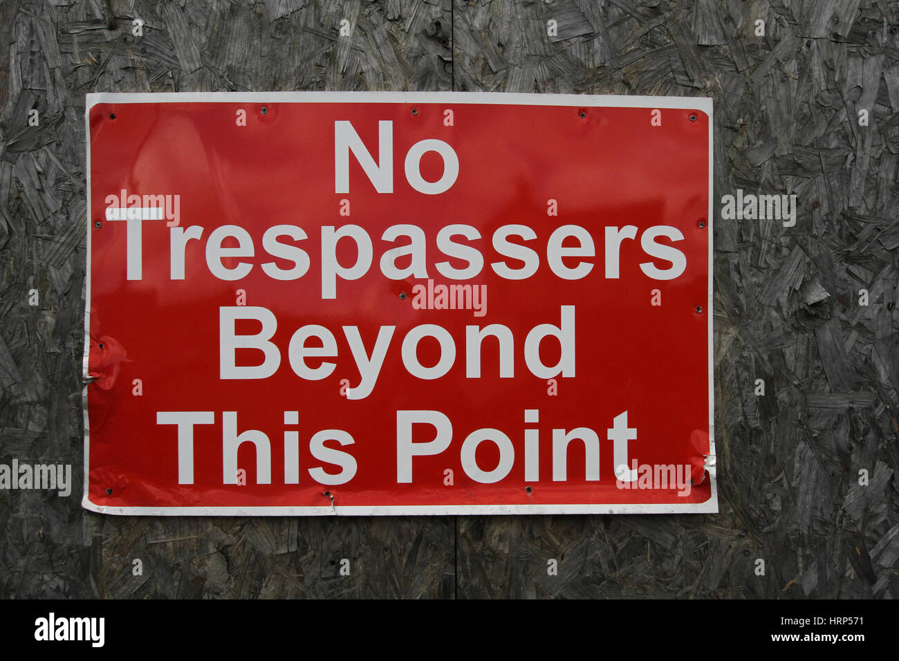 Sign warning "No trespassers beyond this point Stock Photo Alamy