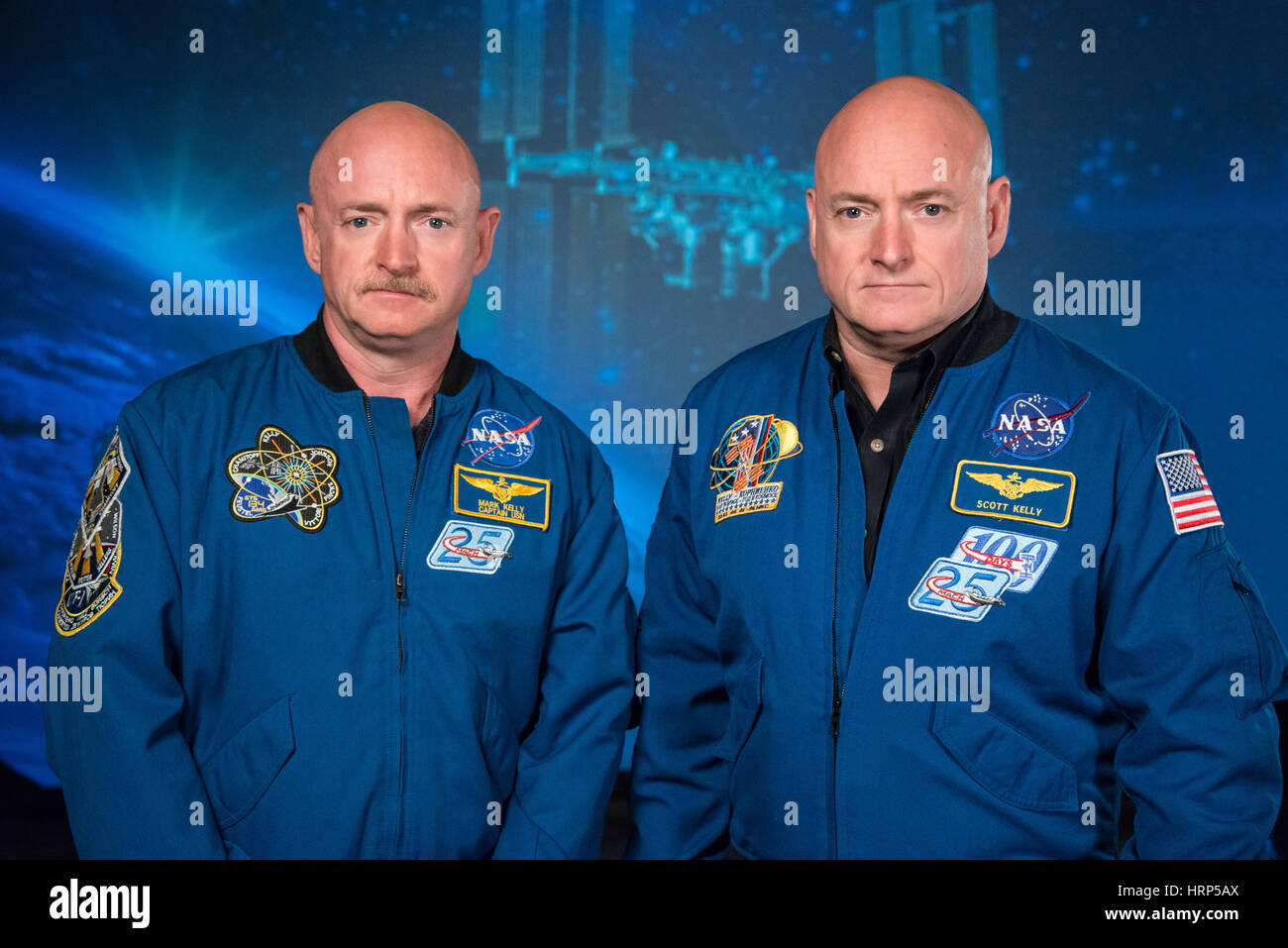 NASA Expedition 45/46 Commander, Astronaut Scott Kelly along with his brother, former Astronaut Mark Kelly at the Johnson Space Center, Houston Texas, 2015. Mark and Scott Kelly are identical twins, and will be studied for changes in their health, comparing a body in space to a body on earth. Scott Joseph Kelly (born February 21, 1964) is an American astronaut, engineer and a retired U.S. Navy Captain. A veteran of three previous missions, Kelly was selected along with Mikhail Korniyenko in November 2012 for a special year-long mission to the International Space Station. Kelly commanded the In Stock Photo