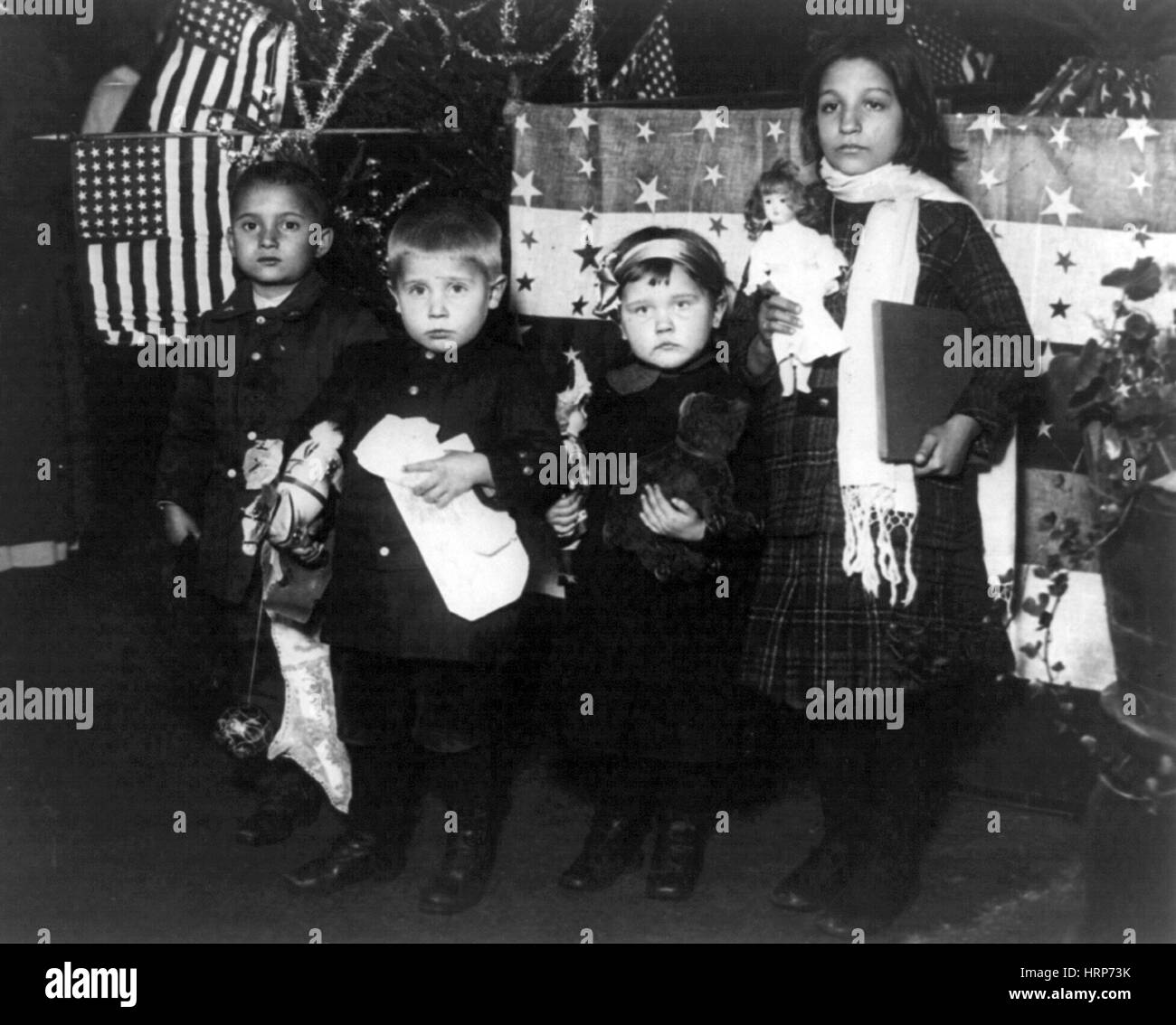Immigrant Children with Christmas Presents, 1918 Stock Photo
