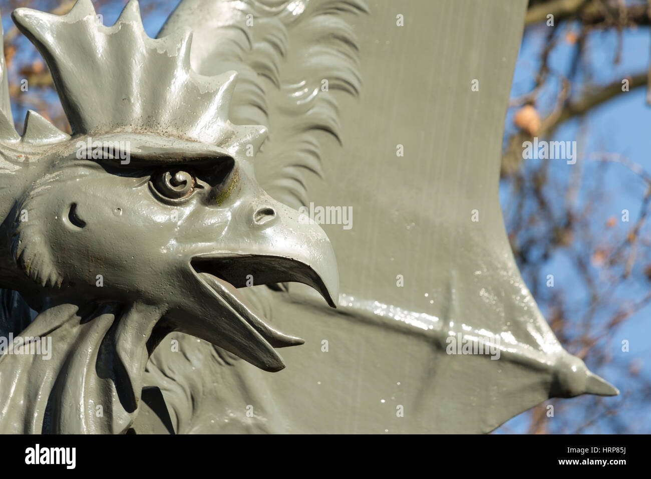 A close up photograph of a basilisk statue in Basel, Switzerland. The Basilisk is a mythical