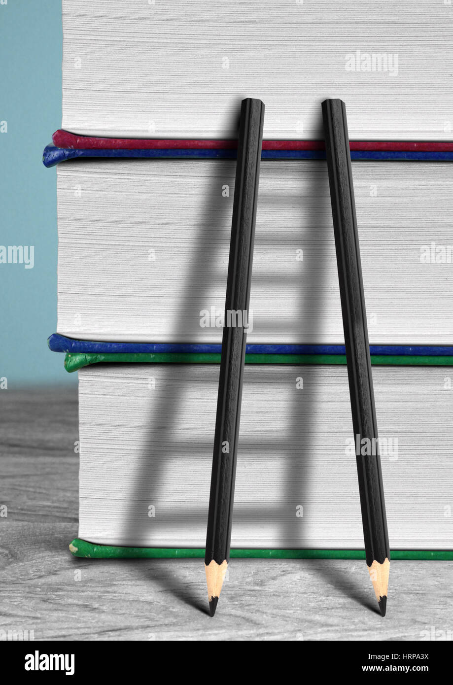 Education concept, pencil Ladder and books Stock Photo