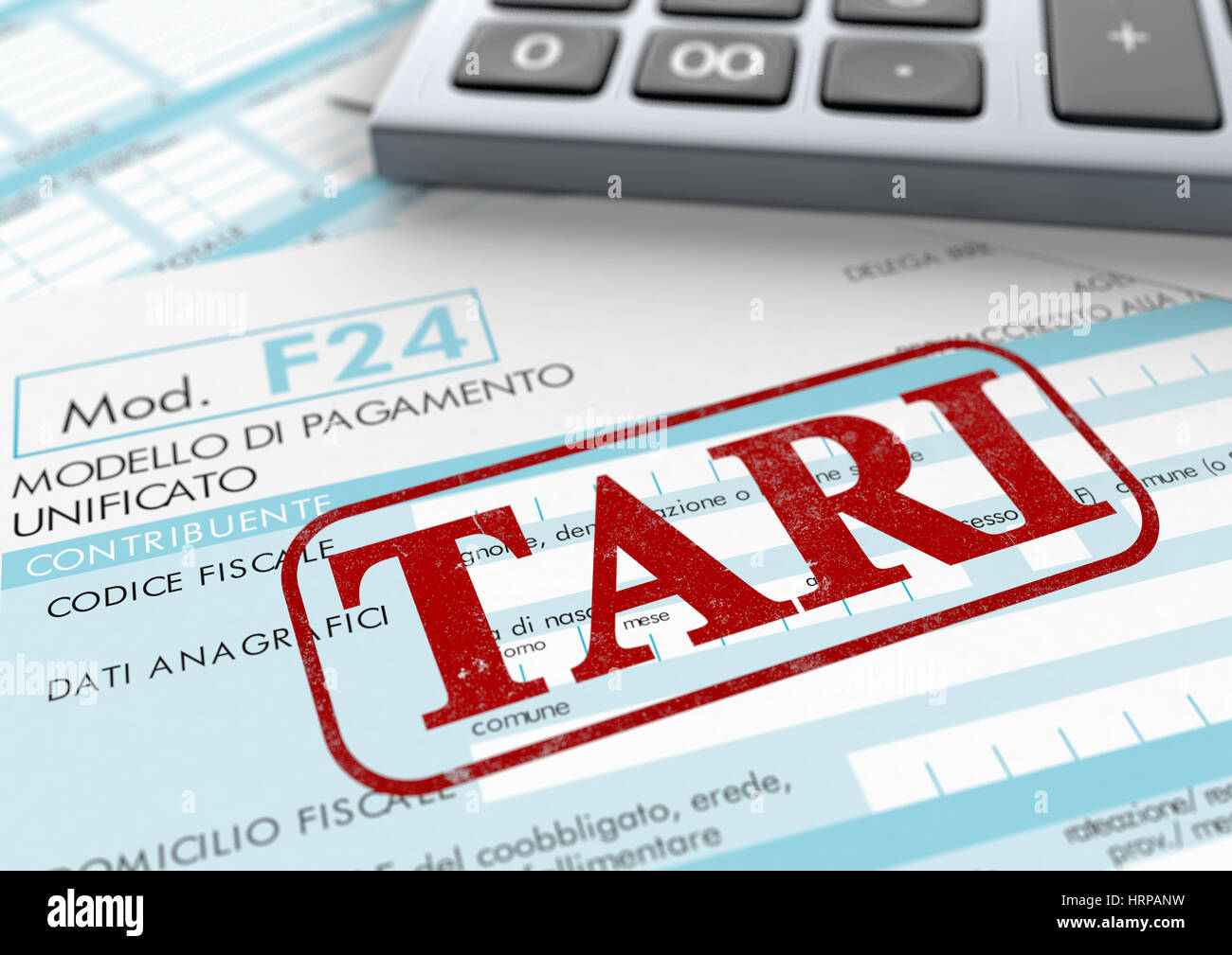 close up view of F24 form for italian taxes,the word tari and an electronic calculator (3d render) Stock Photo