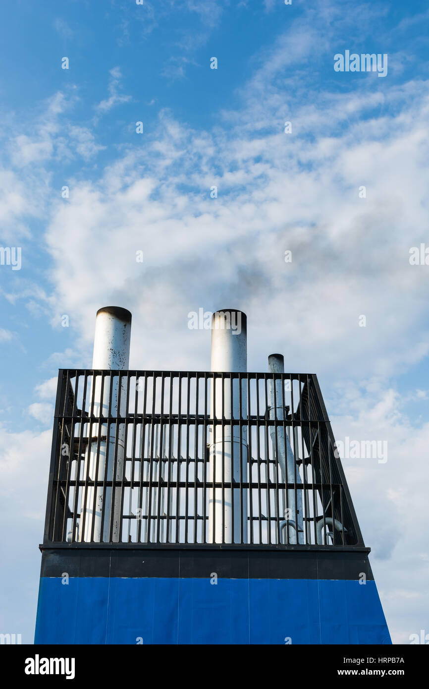 Aboard, chimney of a ferry or cruise ship, black smoke. Pollutes the ...