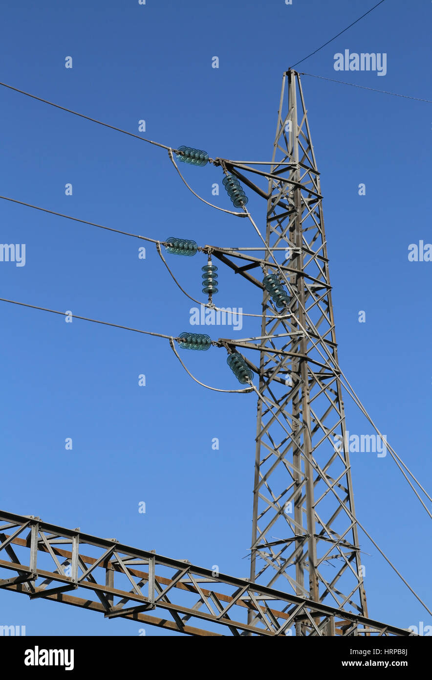 big pylon of high voltage cables with tempered glass insulators Stock ...