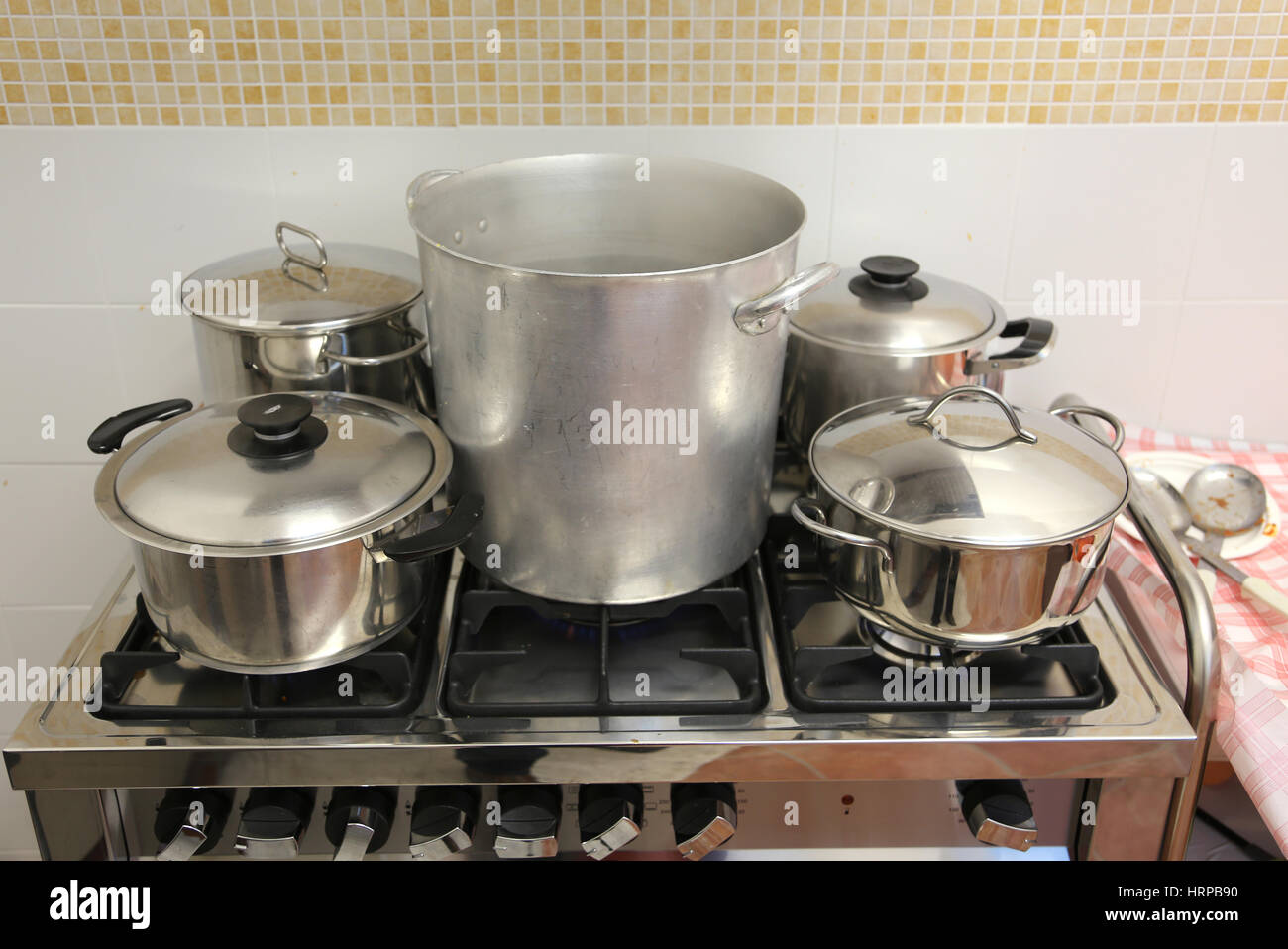 large and small pots in the Commercial kitchen of the restaurant Stock Photo