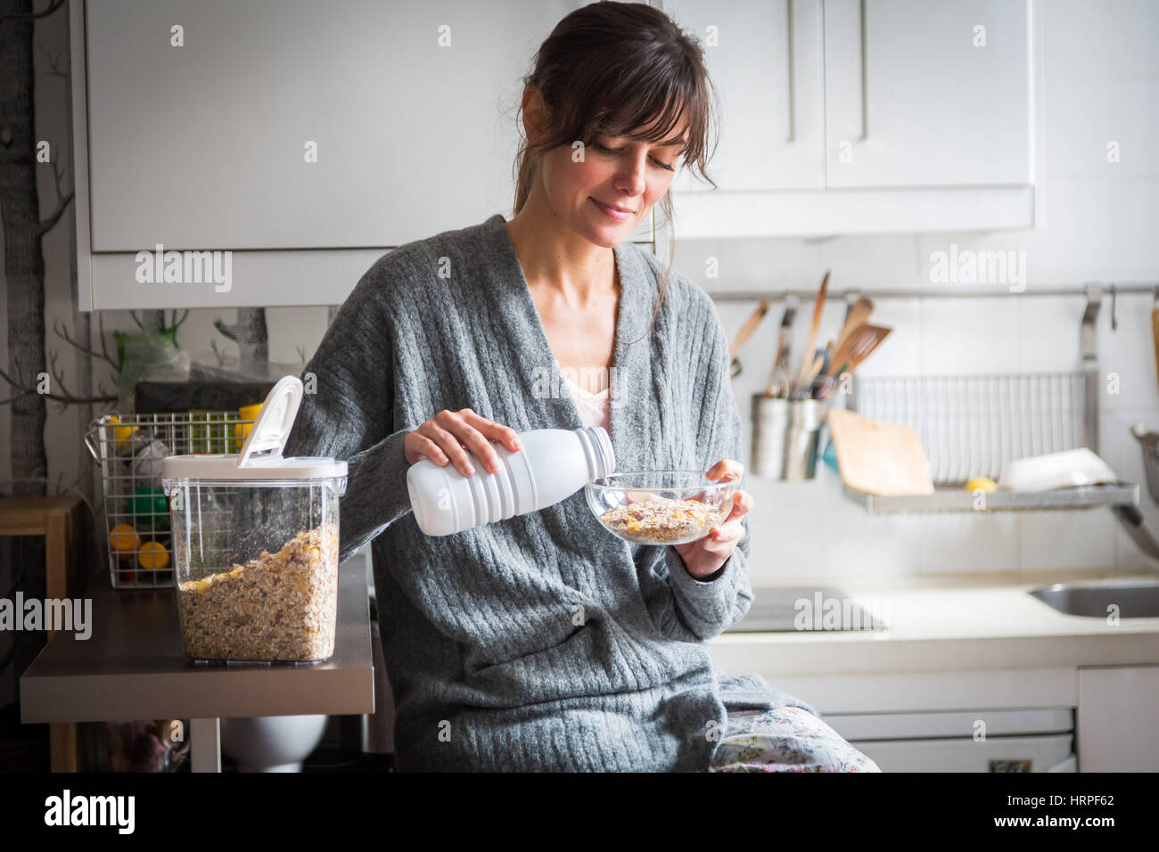 Woman eating muesli Stock Photo Alamy