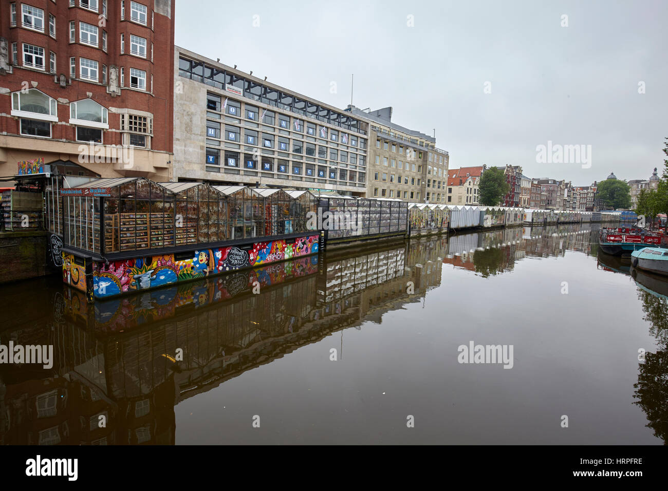 Bloemenmarkt flower stalls floating in the Singel canal, Amsterdam, Netherlands Stock Photo