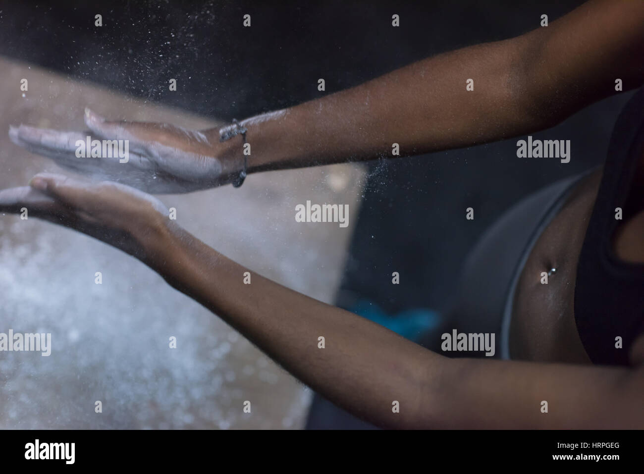 Gym Chalk Magnesium Carbonate hands clapping young african american