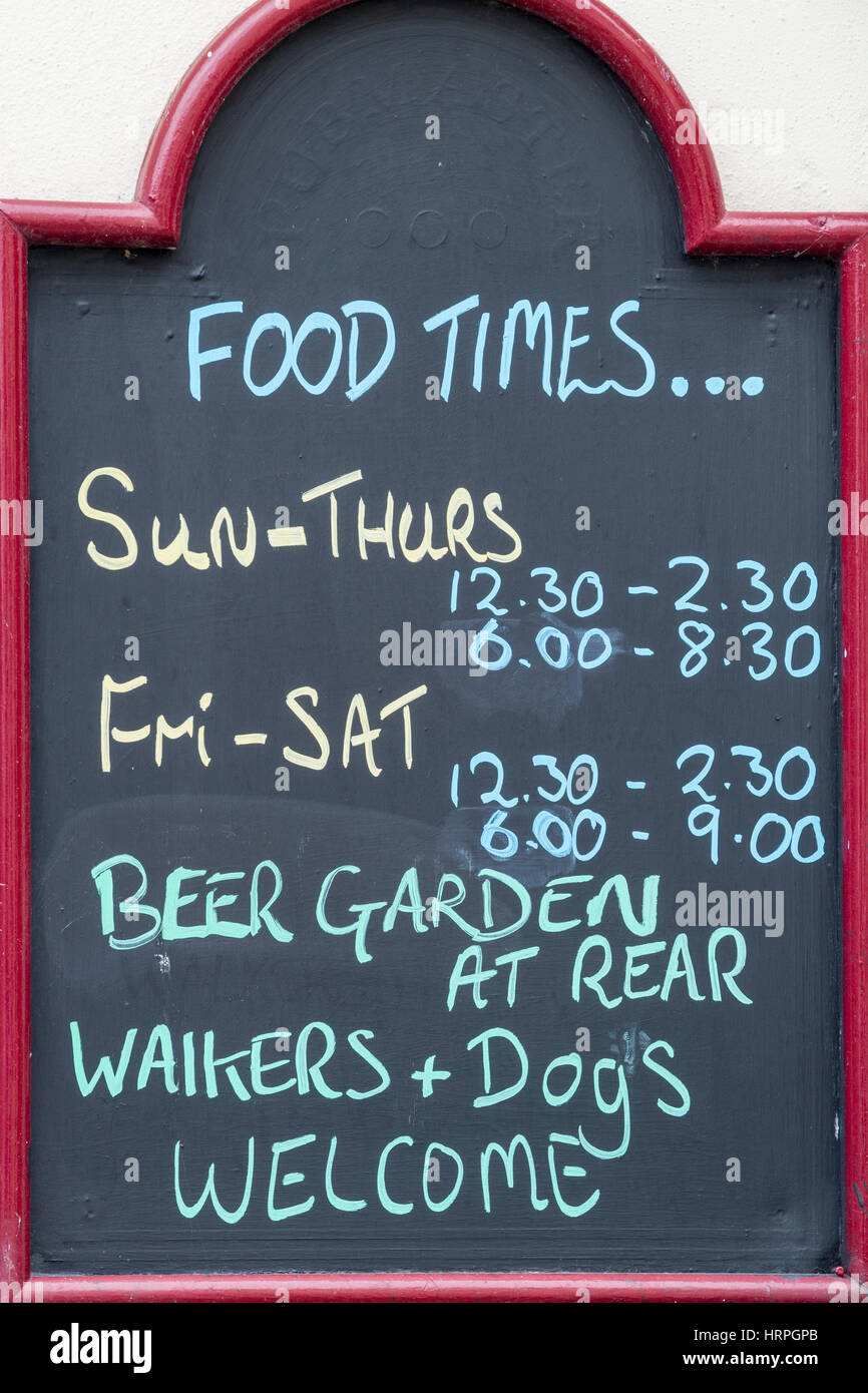 Food times information outside country pub in England. UK Stock Photo