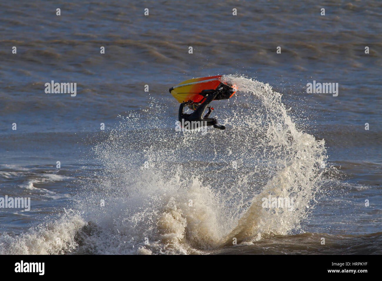 A Man Flipping a Jet Ski on the Waves Stock Photo Alamy