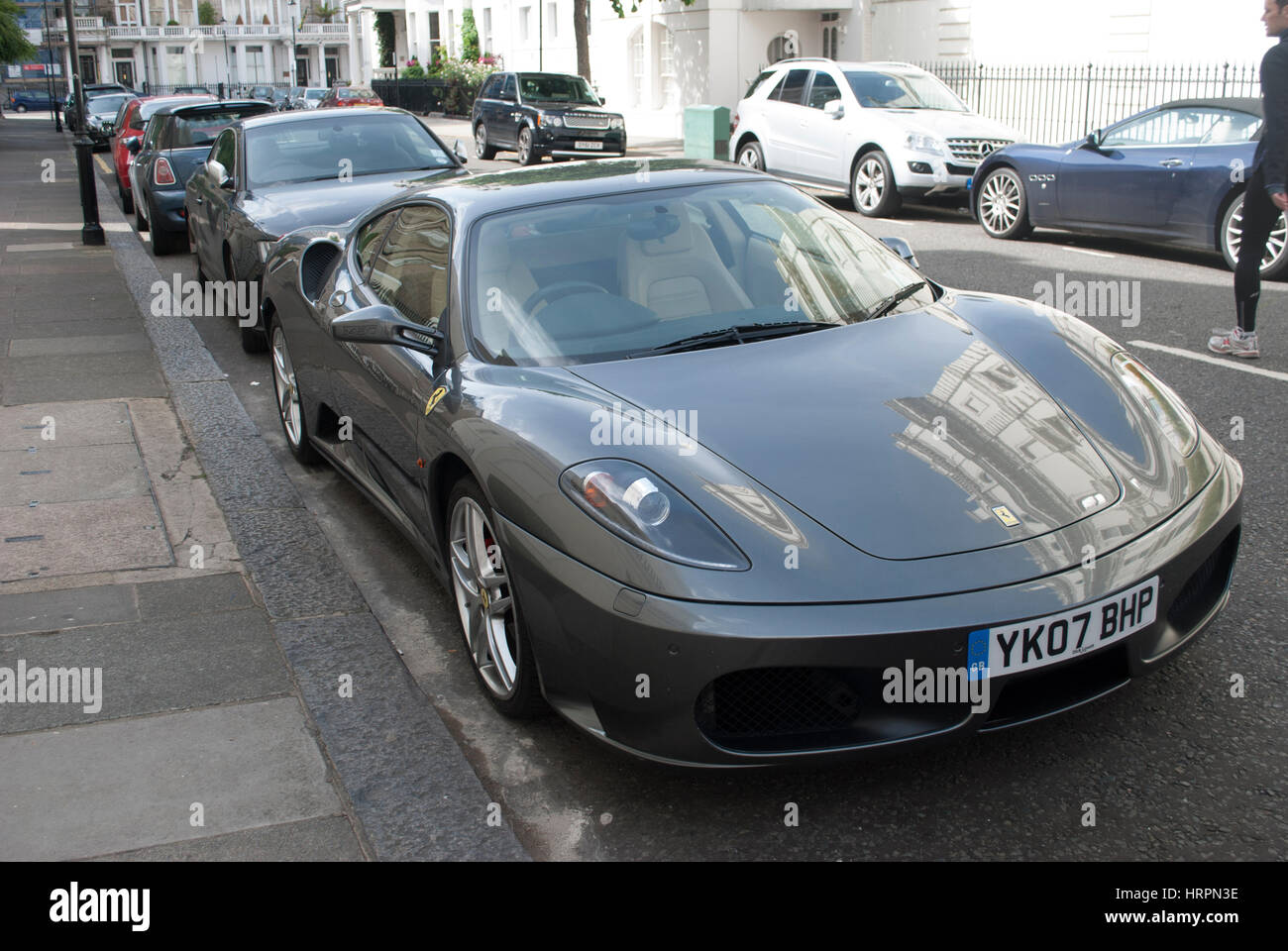 Grigio Ingrid (Grey) Ferrari F430 sports car parked on a street in London Stock Photo