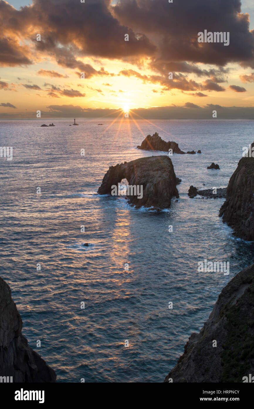 Enys Dodnan Arch Sunset, Lands End Stock Photo Alamy