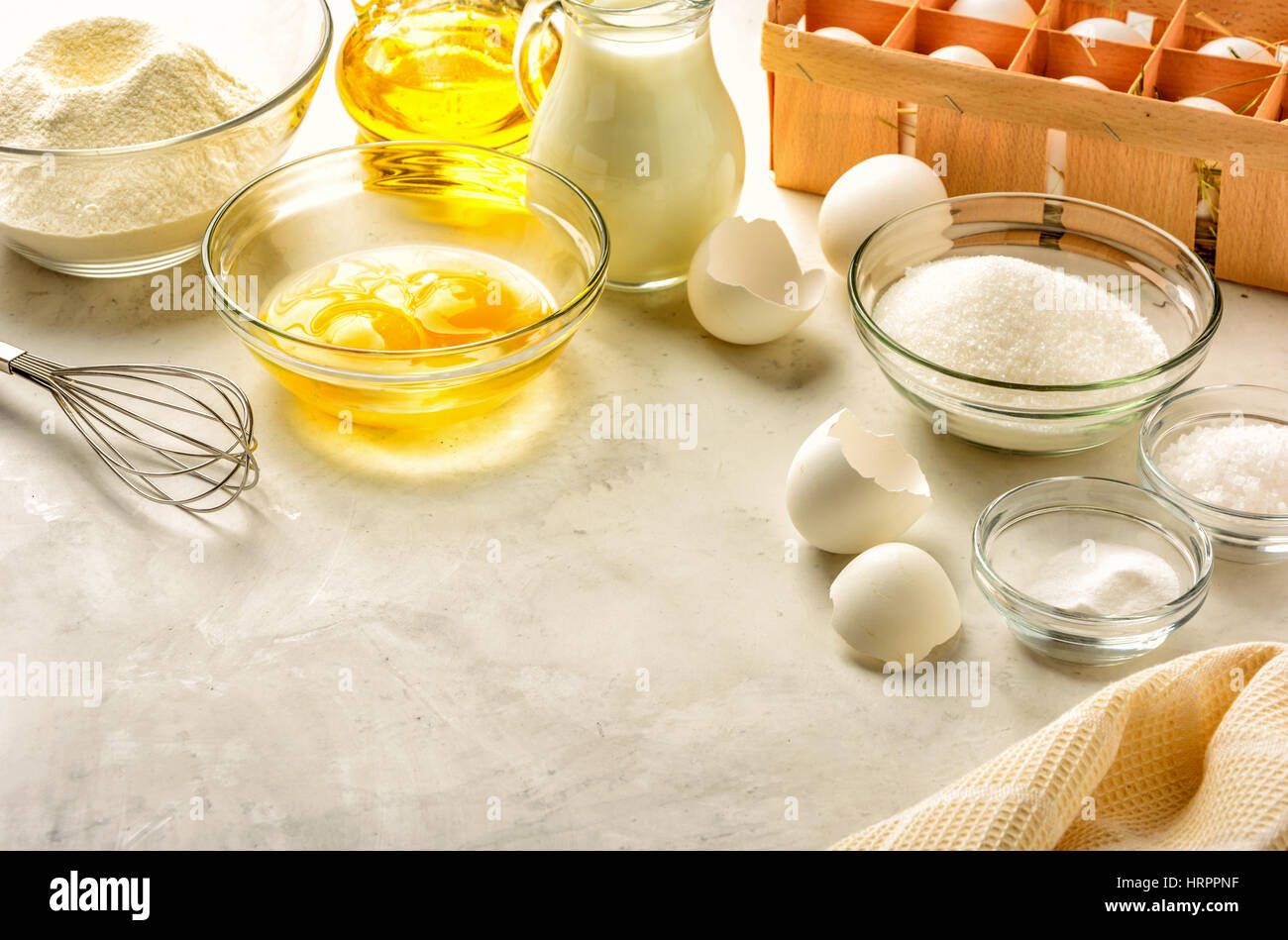 Ingredients for making pancakes on a white background. Copy space. Stock Photo