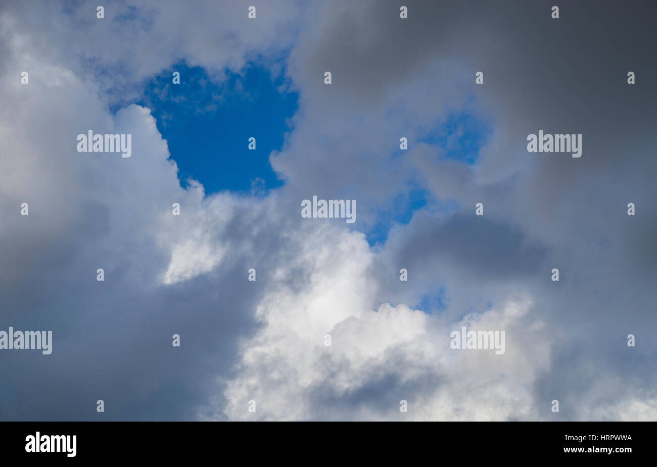 cloudscape,storm clouds against a blue sky Stock Photo