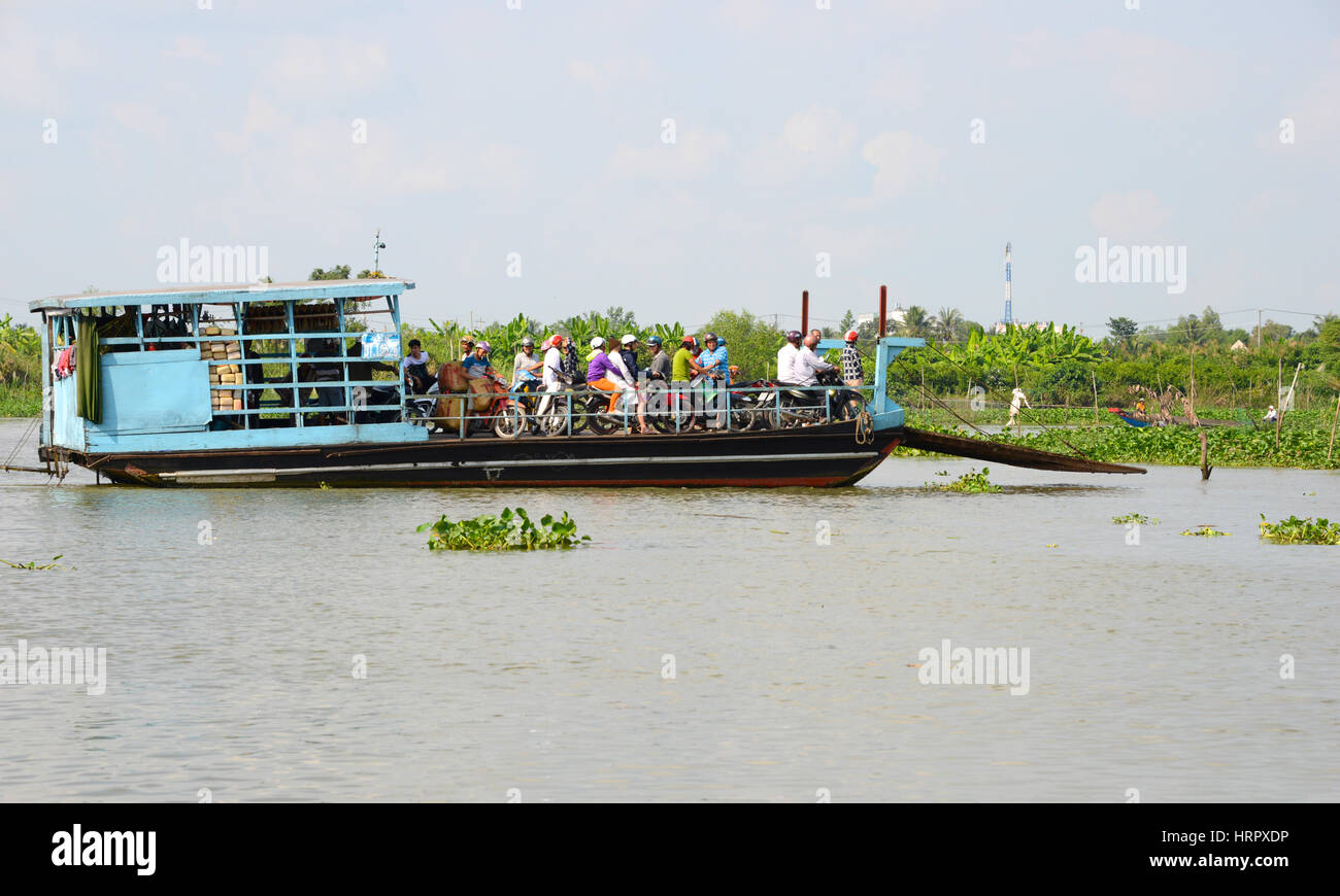 Ferry across the Mekong river, Vietnam Stock Photo - Alamy