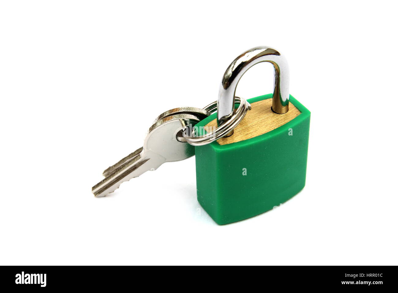 Green padlock, locked, with two keys on white background Stock Photo