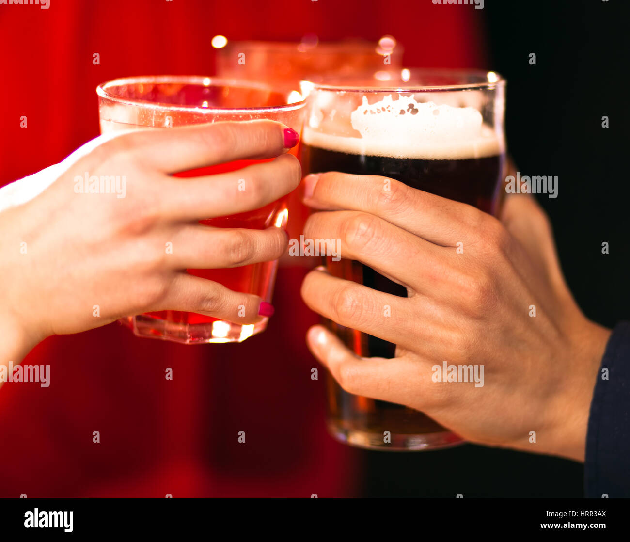Friends toasting glasses in a pub Stock Photo Alamy