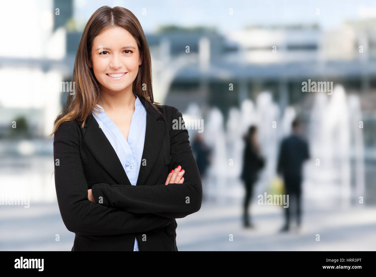 Friendly businesswoman outdoor Stock Photo - Alamy