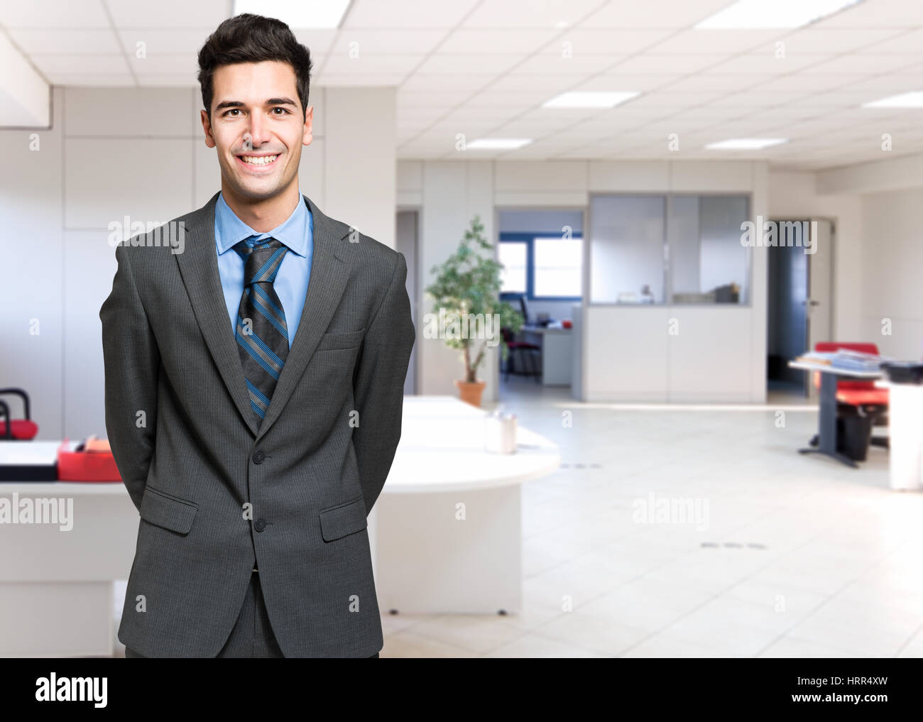 Handsome young businessman portrait Stock Photo - Alamy