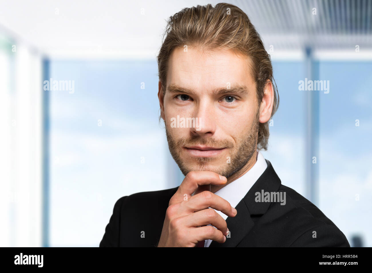 Portrait of an handsome businessman Stock Photo - Alamy