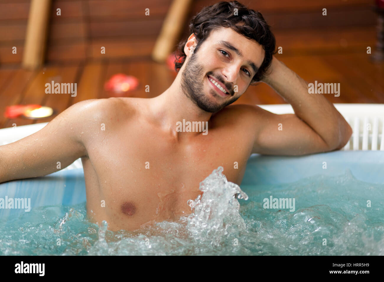 https://c8.alamy.com/comp/HRR5H9/man-relaxing-in-a-beauty-farm-HRR5H9.jpg