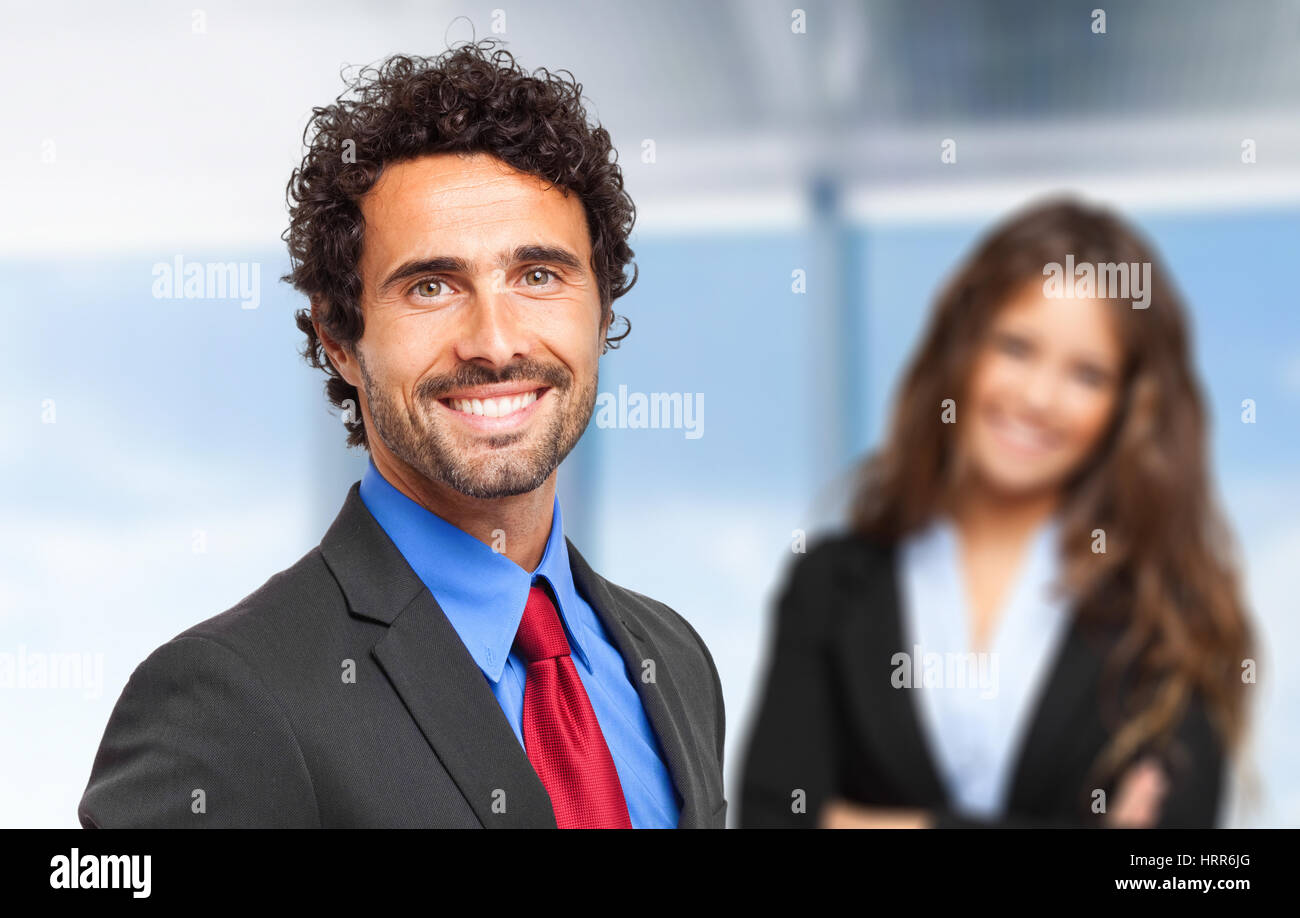 Portrait of smiling business people Stock Photo - Alamy