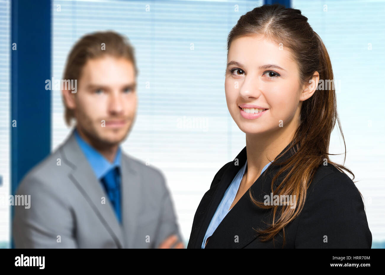 Portrait of smiling business people Stock Photo - Alamy