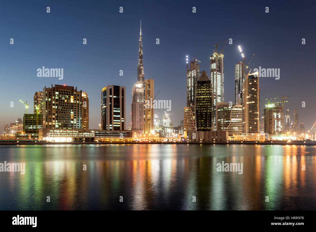 DUBAI, UAE - NOV 27, 2016: The Dubai Business Bay skyline illuminated at night. United Arab Emirates, Middle East Stock Photo