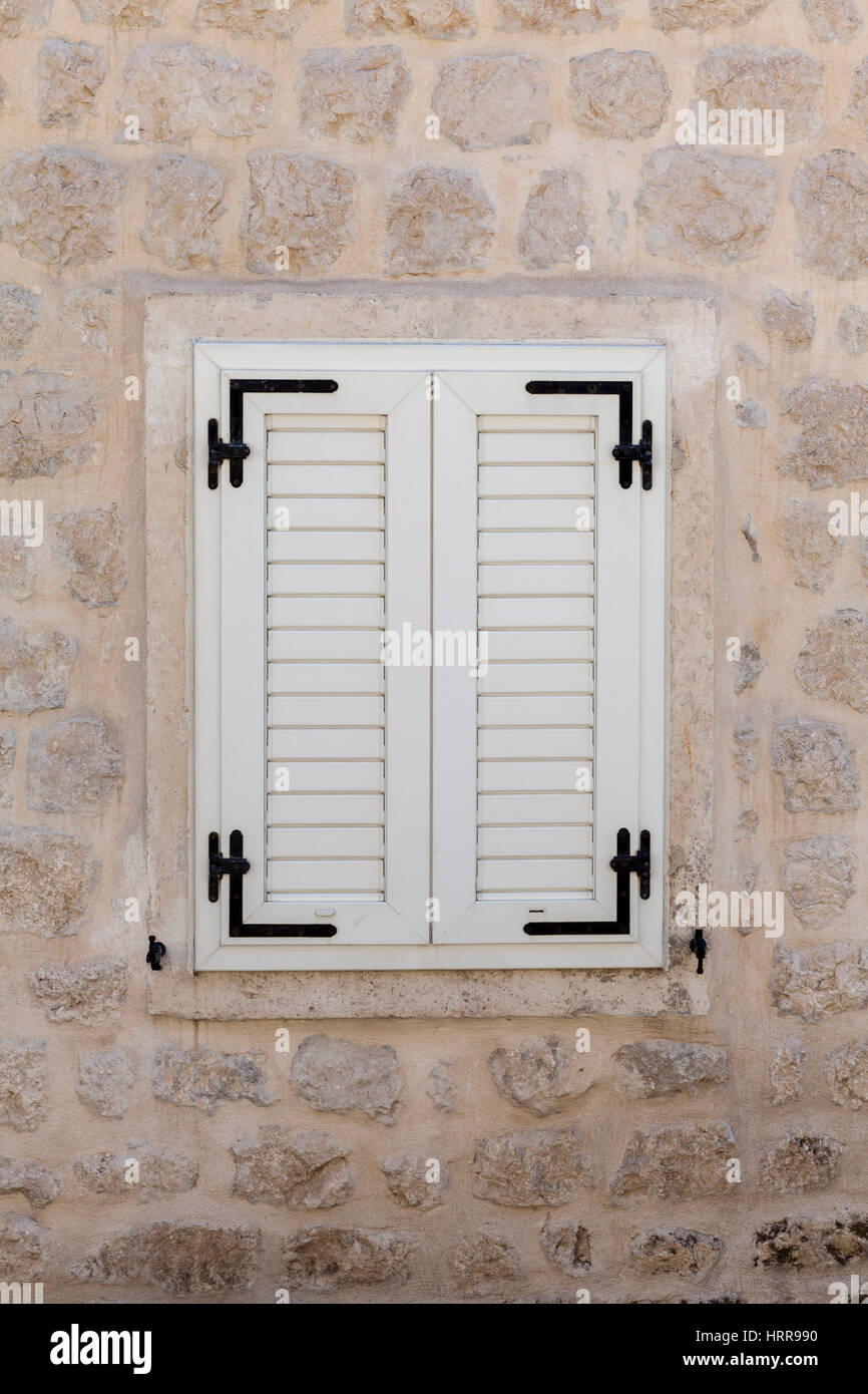 wooden window on stone wall Stock Photo - Alamy