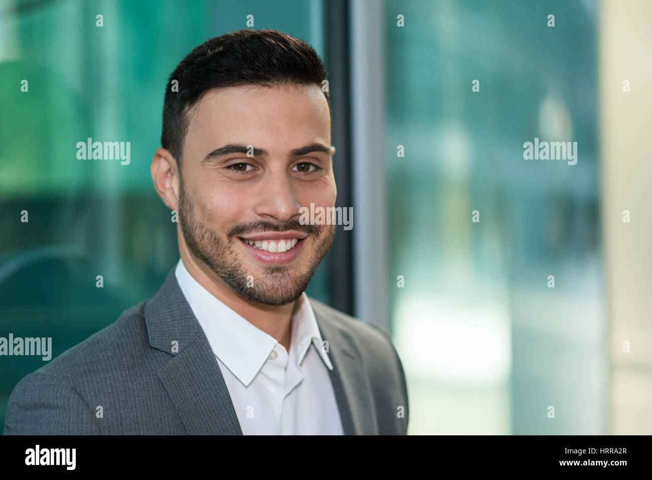 Smiling businessman portrait Stock Photo - Alamy