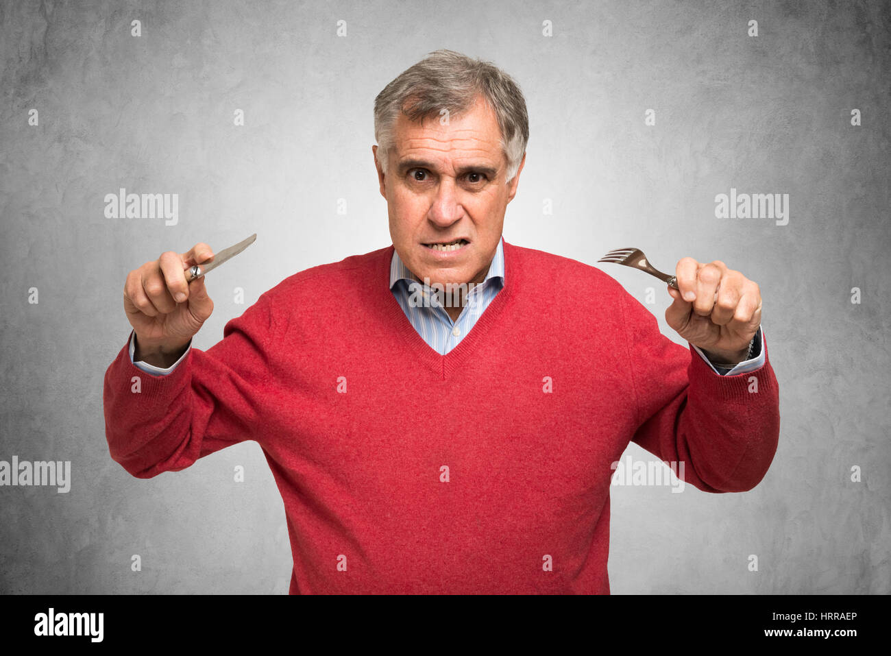Angry man holding knife hi-res stock photography and images - Alamy