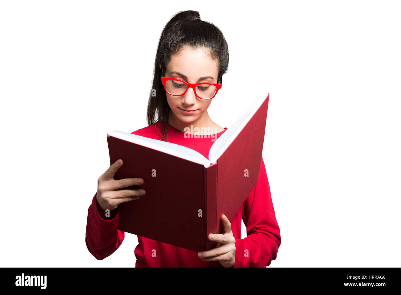 Teenager reading a book. Isolated on white Stock Photo - Alamy