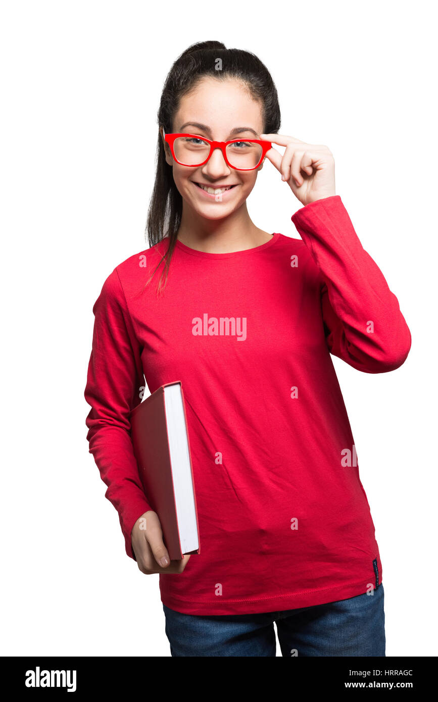 Smiling girl holding a book, isolated on white background Stock Photo ...