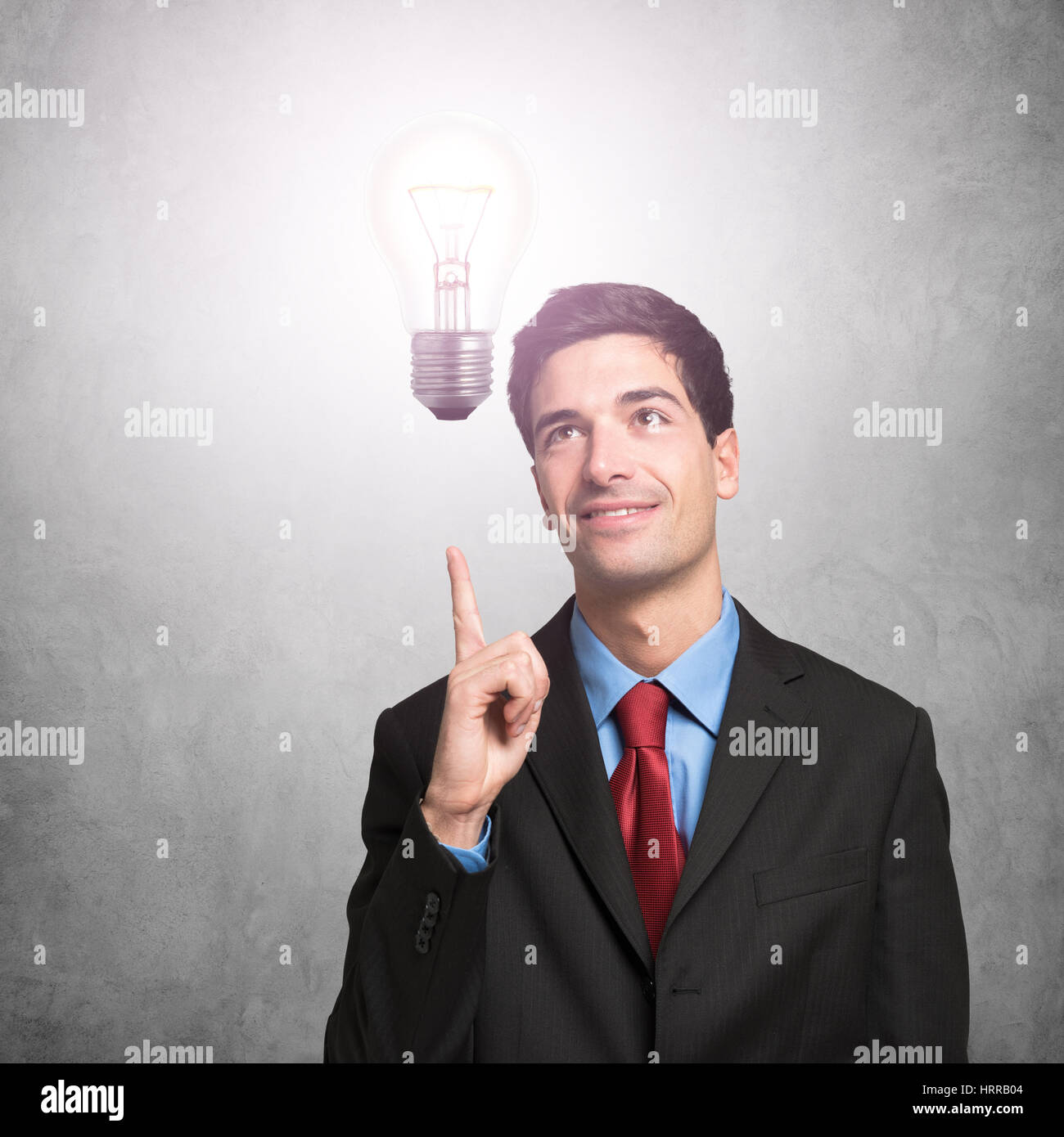 Happy business man having an idea Stock Photo - Alamy