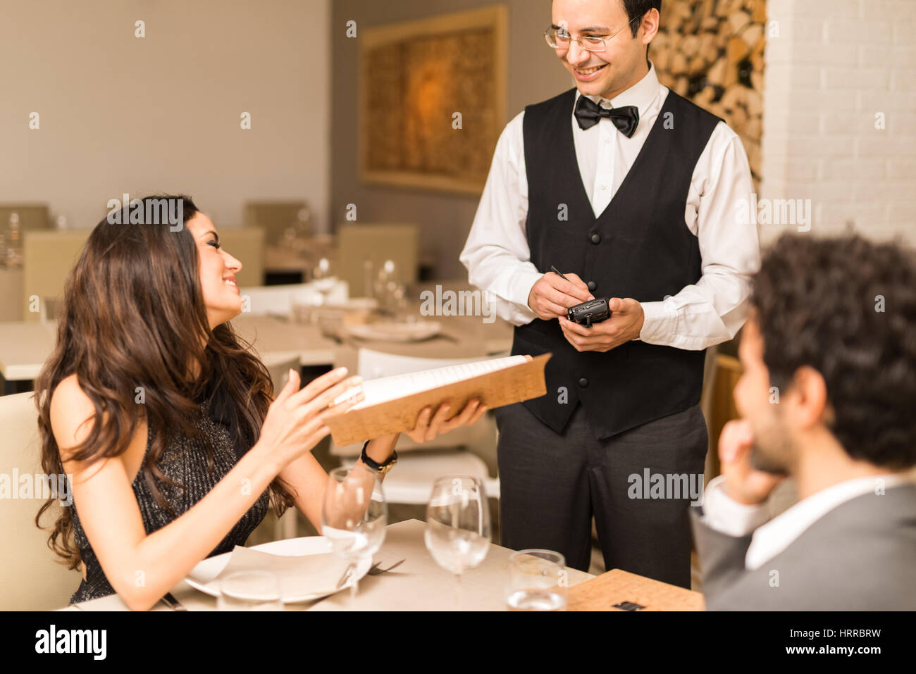 Couple ordering dinner in a luxury restaurant Stock Photo Alamy