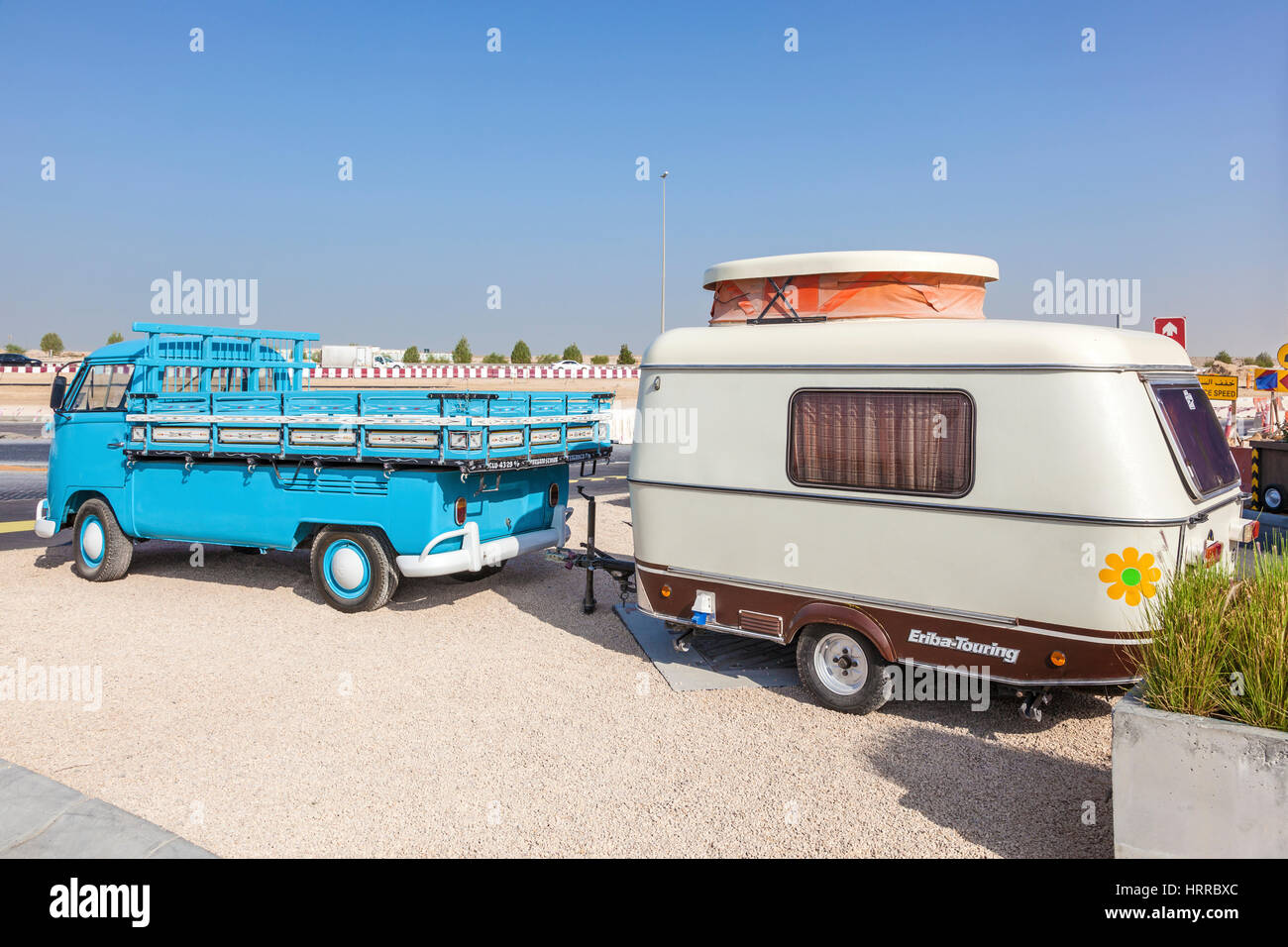 DUBAI, UAE - NOV 27, 2016: Historic Volkswagen T1 with an old Eriba-Touring caravan at the Last Exit food trucks park in Dubai, United Arab Emirates Stock Photo