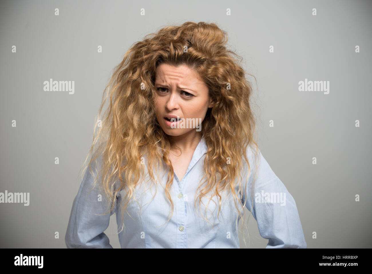 Portrait of an annoyed woman Stock Photo