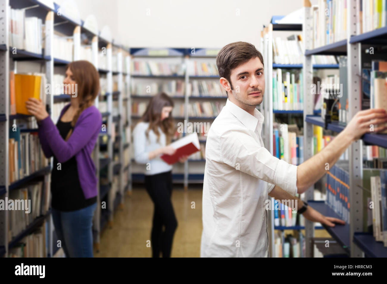 Group of people in a library Stock Photo - Alamy