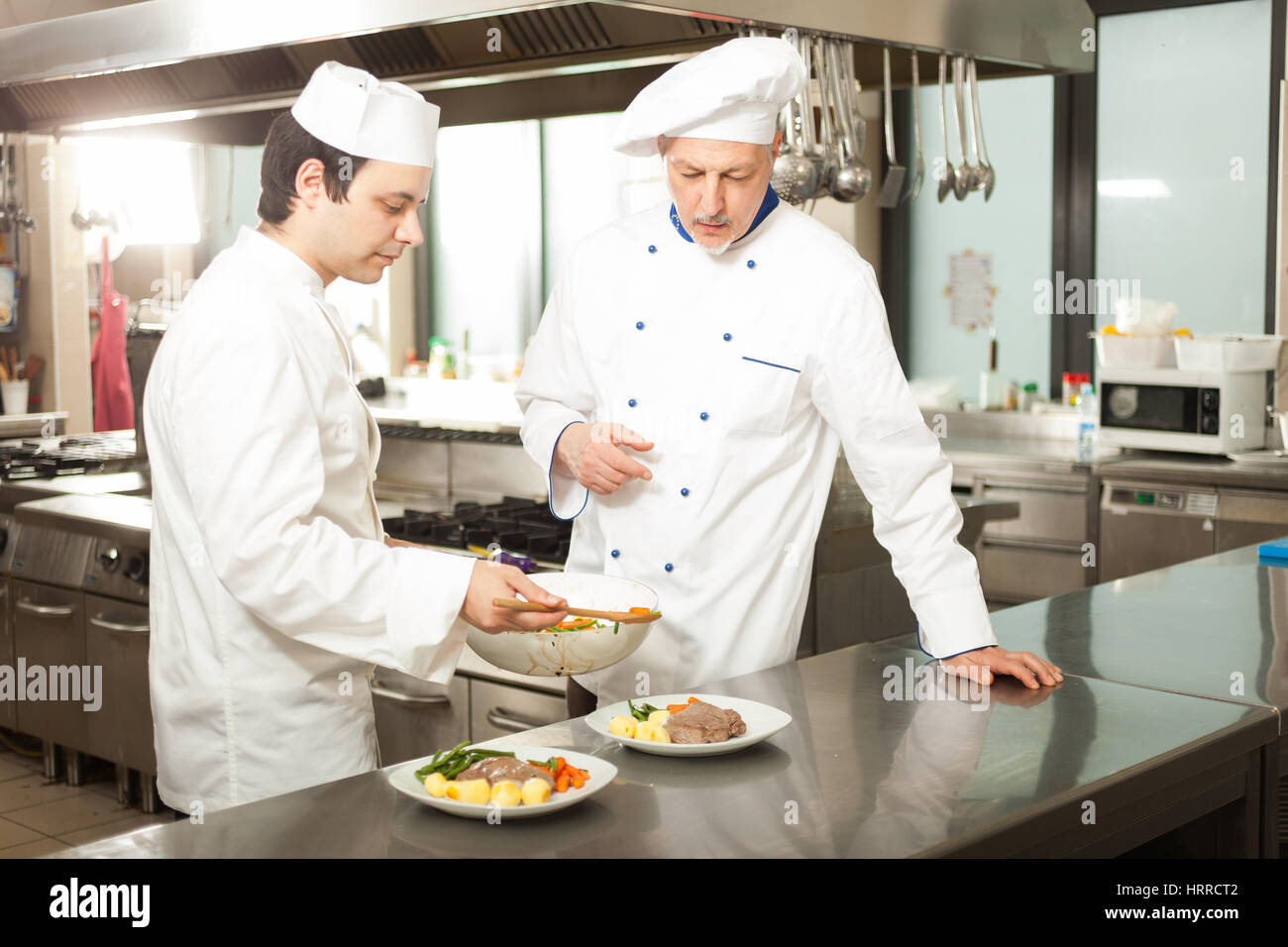 Professional chefs at work Stock Photo Alamy