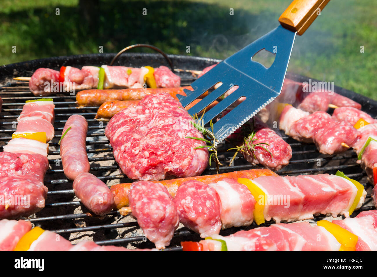 Detail of meat on a barbeque grill Stock Photo Alamy