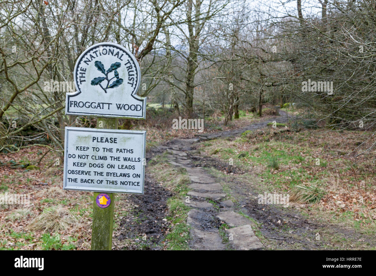 Sign at the start of a public footpath through Froggatt Wood, Derbyshire, England, UK Stock Photo