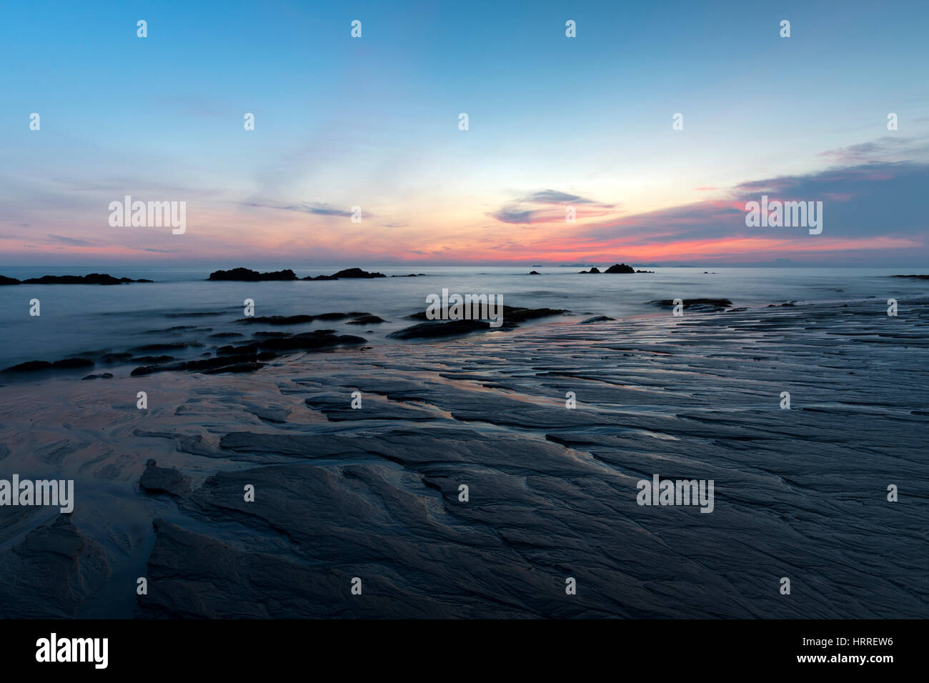 Sunset at the sea Stock Photo - Alamy